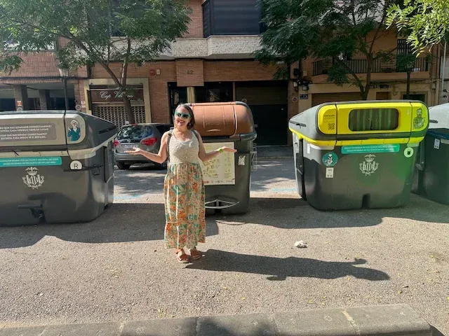 The irony that the only pic of me is in front of trash is not lost on me. I did always love the Forkie character. This is right when you walk out of our apartment, the perks of living in the city--Trash and recycling front and center. ; ) 